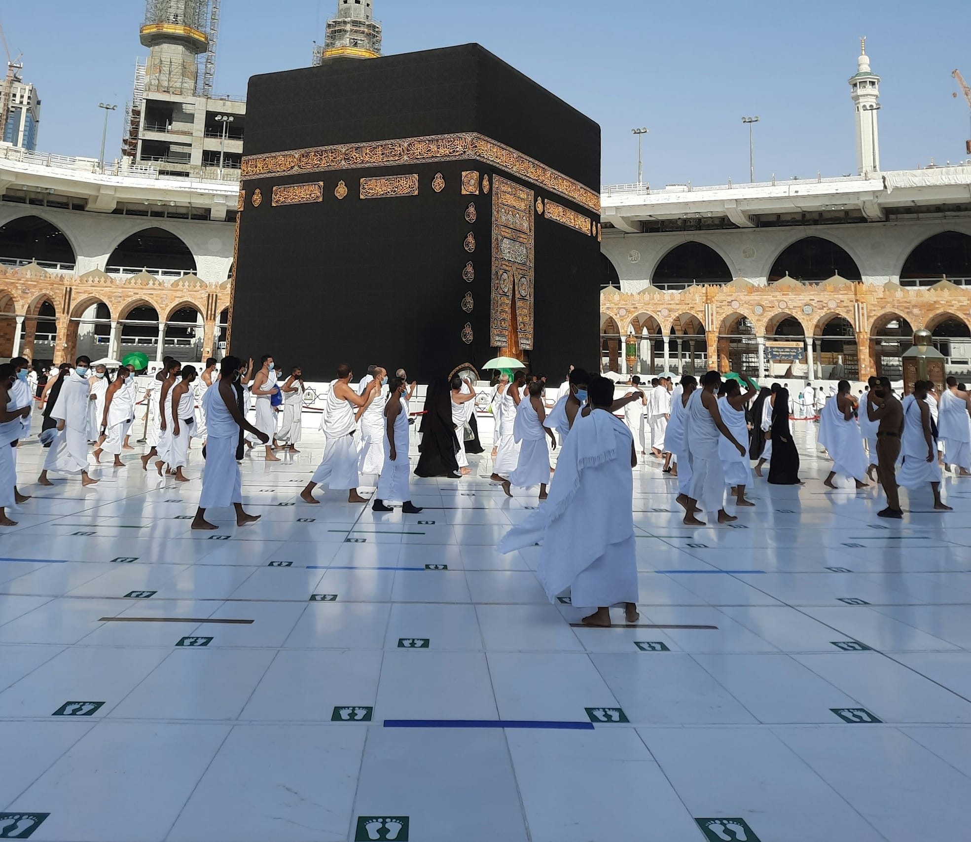 a group of people standing in front of a building